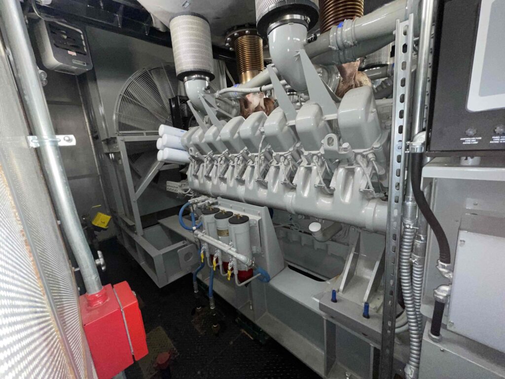 A well-maintained commercial generator in a clean environment, highlighting the importance of keeping the generator clean for efficient performance and reliability.