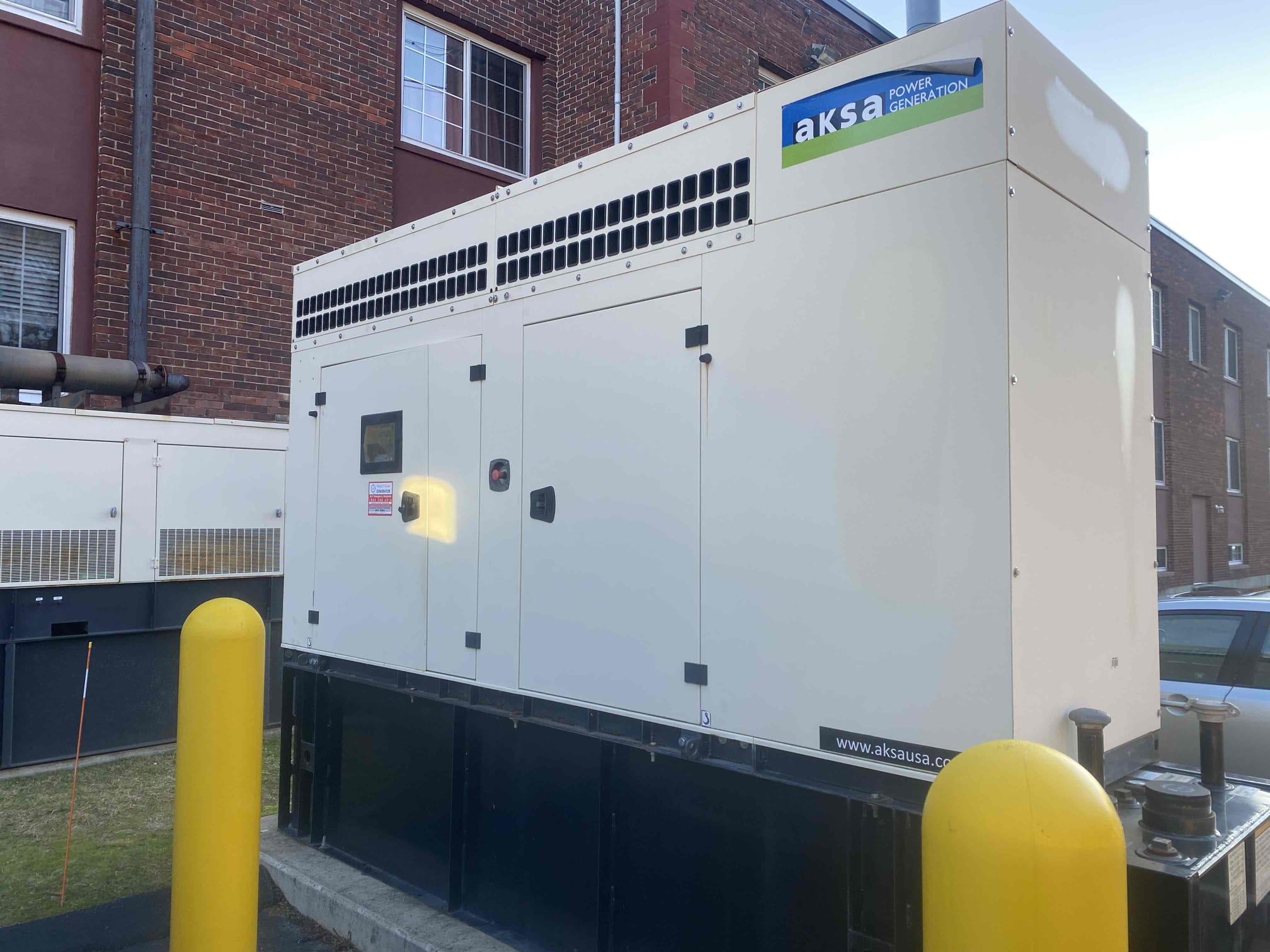 Diesel powered generator installed outside, providing a back up power source to medical facility.