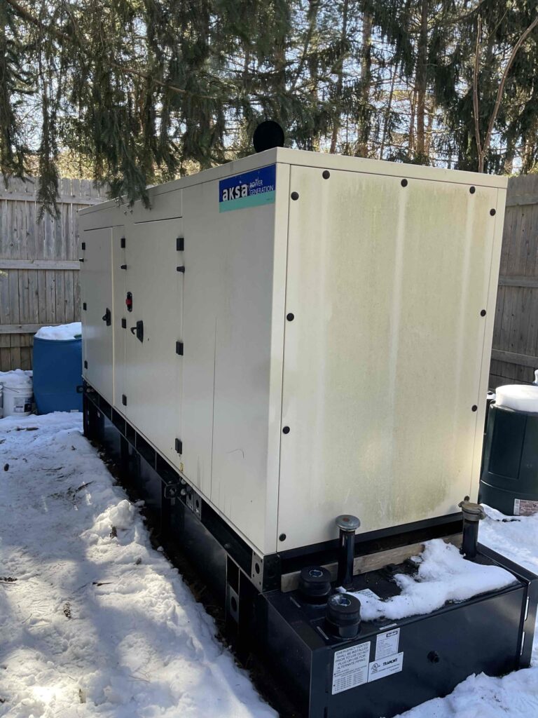 AKSA generator after a snow storm