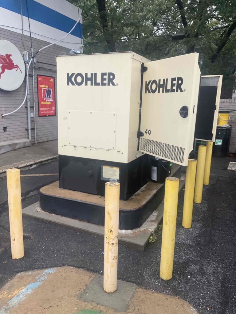 Mobil Gas station with Kohler backup generator being maintained to ensure the gas station is compliant with New York Agriculture and Markets Law Article 16, Section 192-H