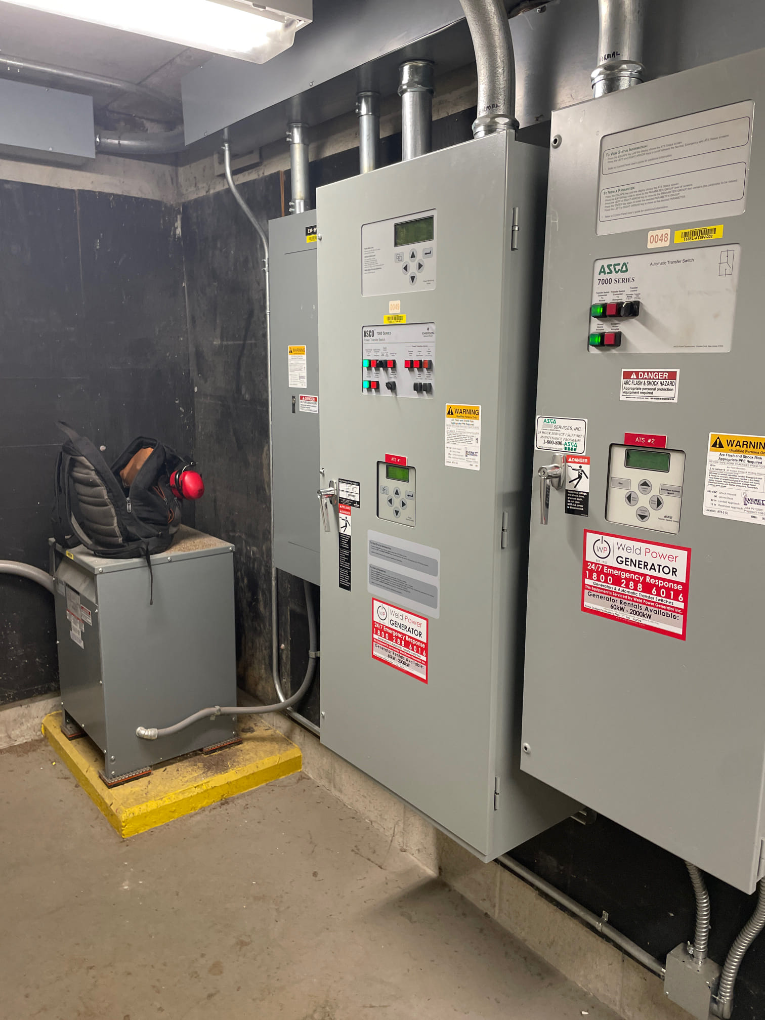 ASCO transfer switches being tested by a Weld Power Generator service technician. The ATS provides back up power to a hospital in Providence Rhode Island.