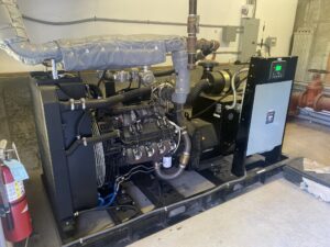 Commercial Generator head attached to a commercial generator engine powering a university dorm room in Providence Rhode Island.