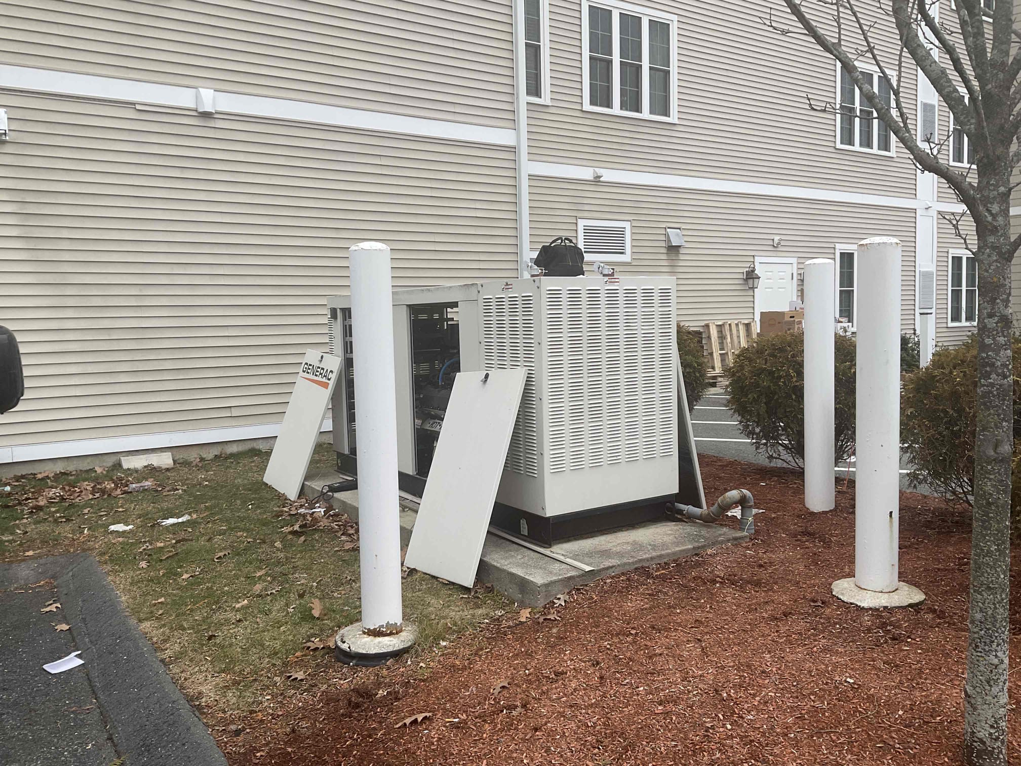 Generac Generator that powers a nursing home. Weld Power technician is performing an oil change