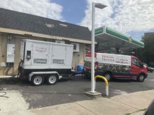 Weld Power Generator Service Van in front of a Weld Power Generator Rental at a BP Gas Station in New York. The generator is powering the facility in a controlled test of their Power Outage Contingency Plan