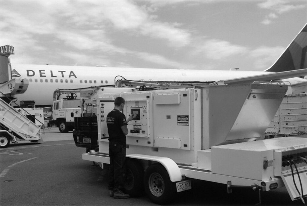 Weld Power generator technician performing a load bank test at Logan Airport in Boston, MA as part of their preventative maintenance program. 