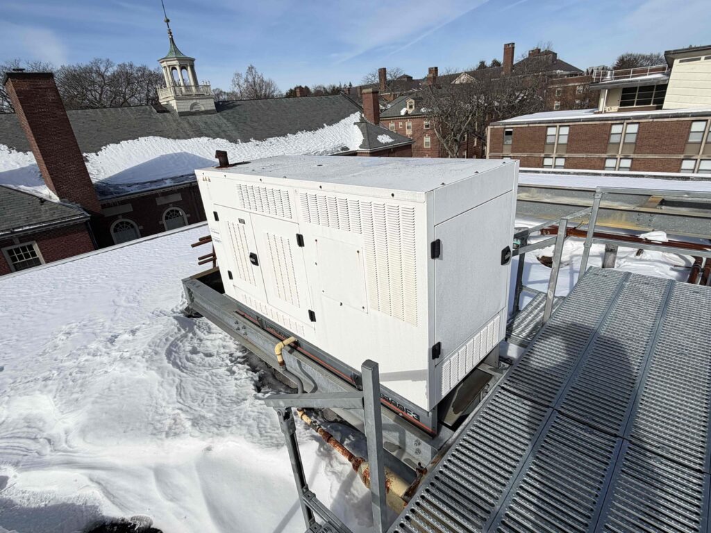 Rooftop mounted generator providing back up power to a university dormitory. 