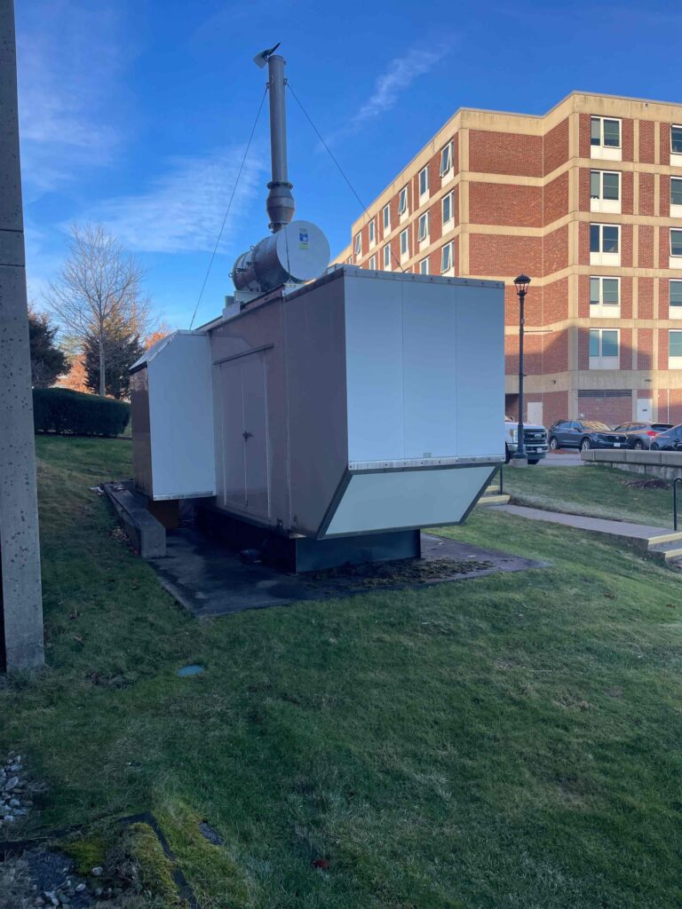 Generator providing back up power to a university dormitory. 