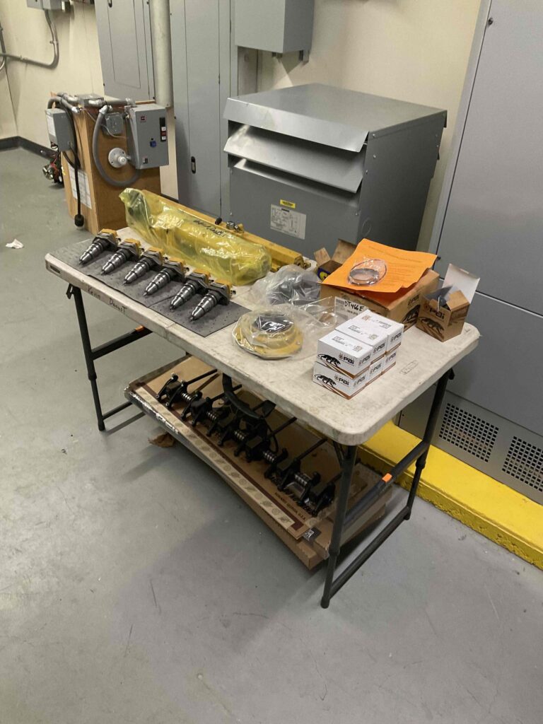 Various parts laid out for Generator Engine Overhaul