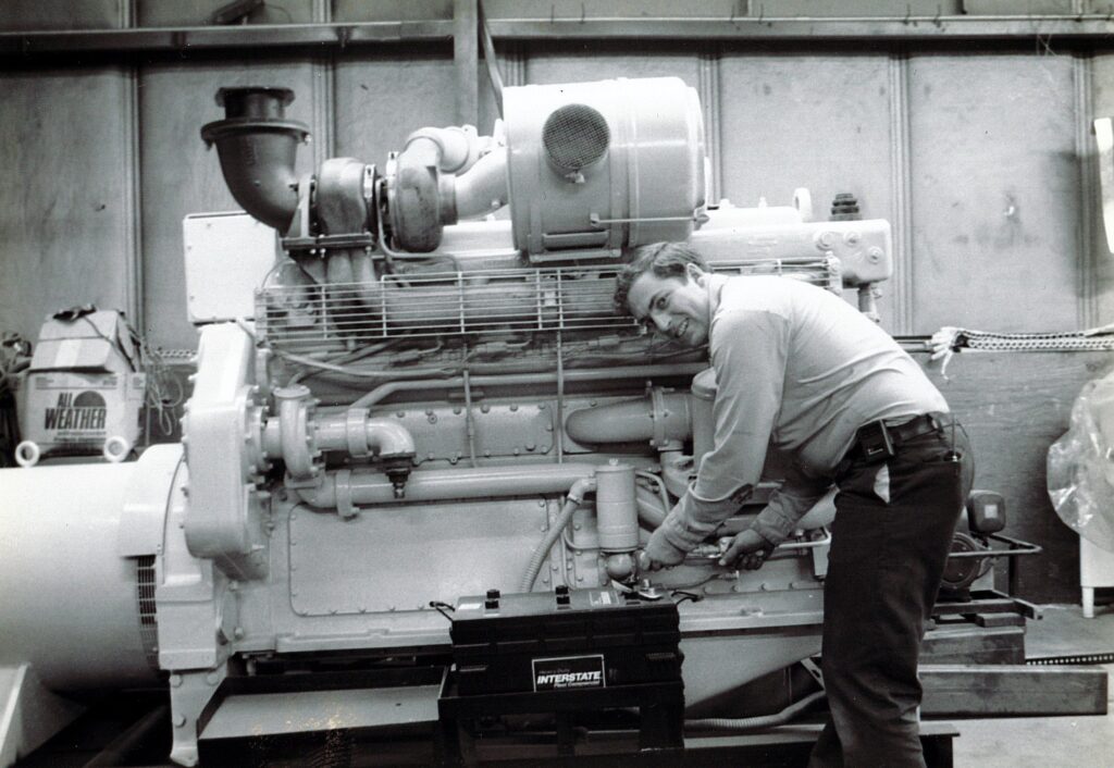 Weld Power Generator technician working on a generator