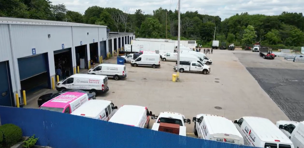 Fleet of Weld Power Generator service vehicles with our large rental fleet on display in the background