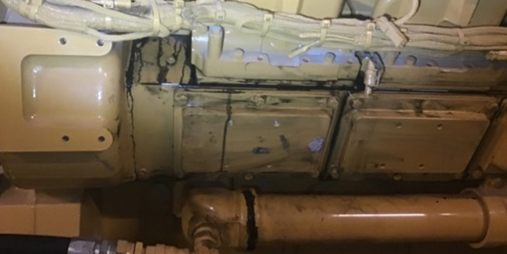 This generator was run without a load for an extended period of time. This has lead to Wet staking which is easily identified by the oily black residue seen on the equipment