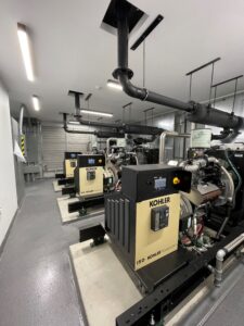Three 150 kW Kohler generators providing back up power to a mixed use property for a major property management company