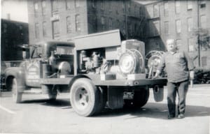 Weld Power Generator Technician in front of one of our first service vehicles. 
