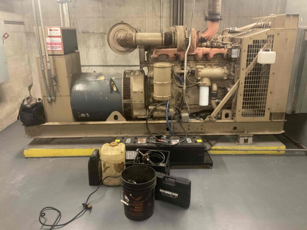 preventive maintenance being performed on an old generator to extend the generator lifespan. 